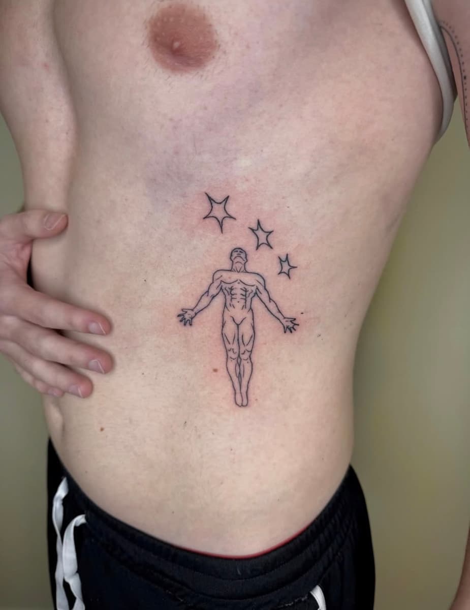 Fine line upper back tattoo of three roses growing from dumbbells